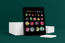 Load image into Gallery viewer, Moons Wellness Journal. The cover shows marble-like moons getting larger row by row