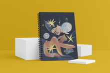 Load image into Gallery viewer, North Star Wellness Journal. The cover shows birds, ornaments, and figure
